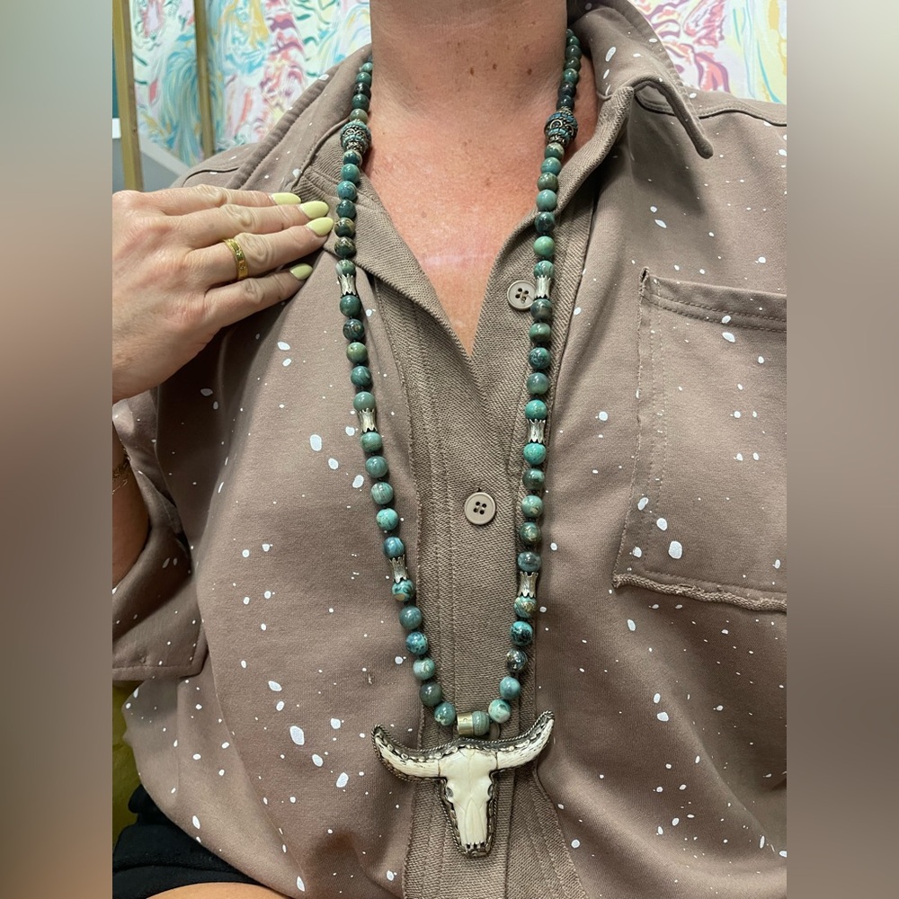 Turquoise Beaded Necklace with Horn Pendant
